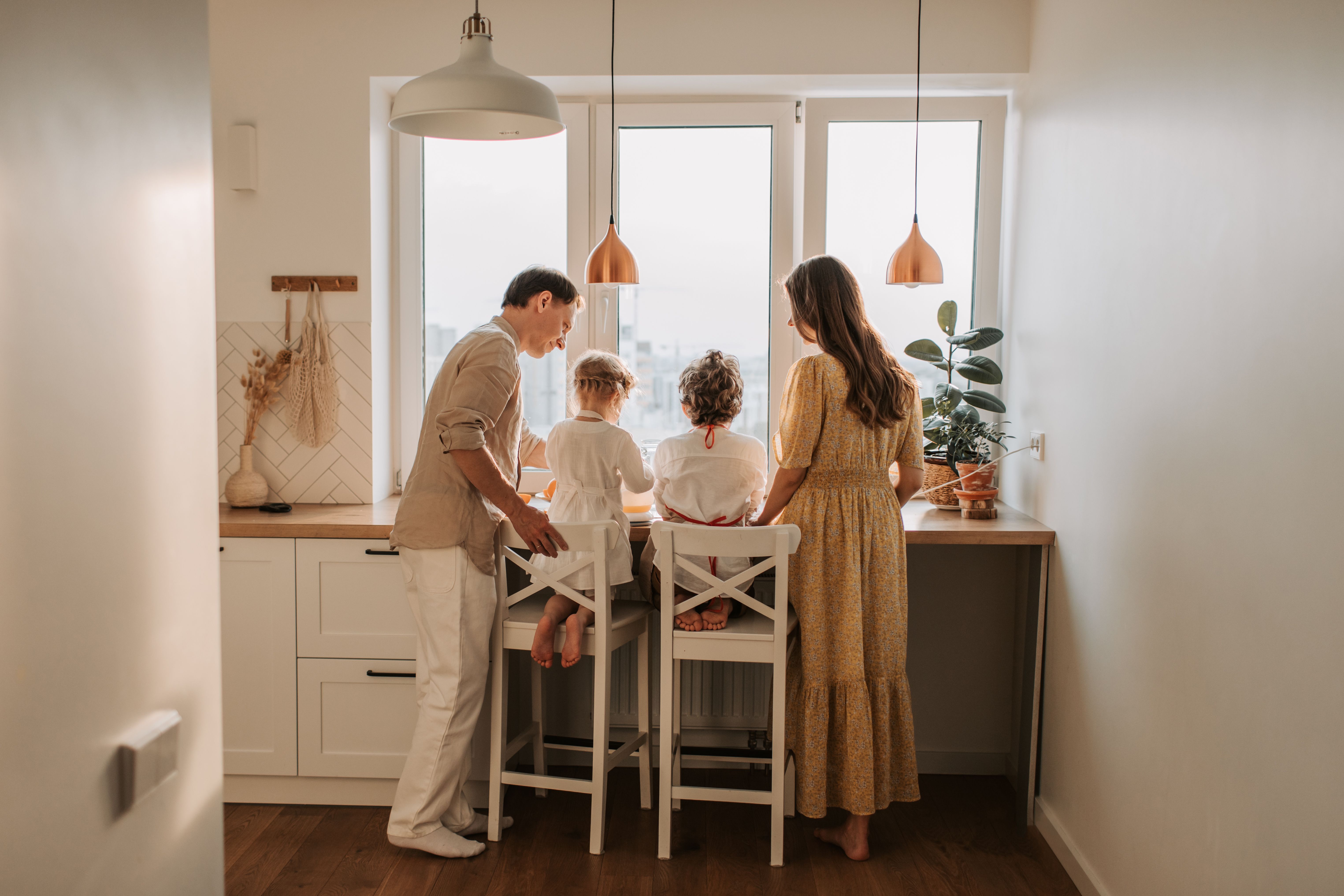 Family gathered together at home, reflecting caregiver support, connection, and everyday communication.